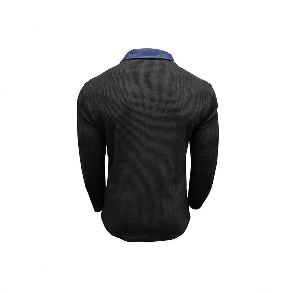 Man wearing a long-sleeved waffle-textured polo shirt in a loose fit with an asymmetric design detail.