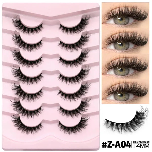 Box of natural style false eyelashes made from artificial fibre, includes adhesive glue