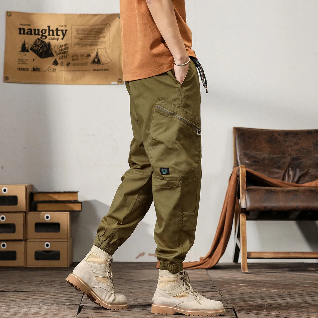 Men's loose cotton harem style trousers with tapered ankle banding in khaki colour
