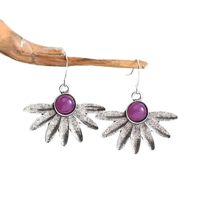 Purple animal Zodiac bohemian style earrings with resin gemstone details and alloy metal construction