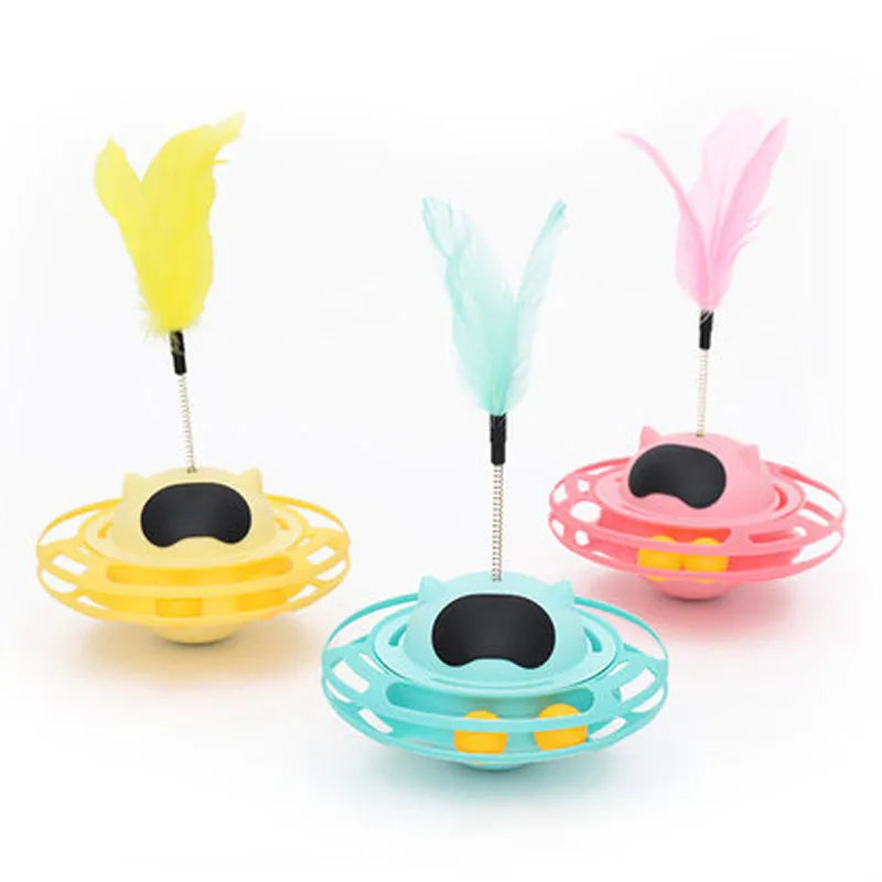 17cm diameter rotating cat toy turntable with ball attachment in pink, blue, yellow, and white colour options