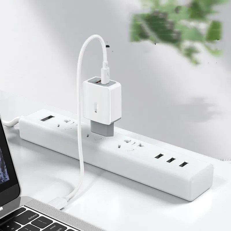 White phone fast charge charger set with USB cable and charging head on white background