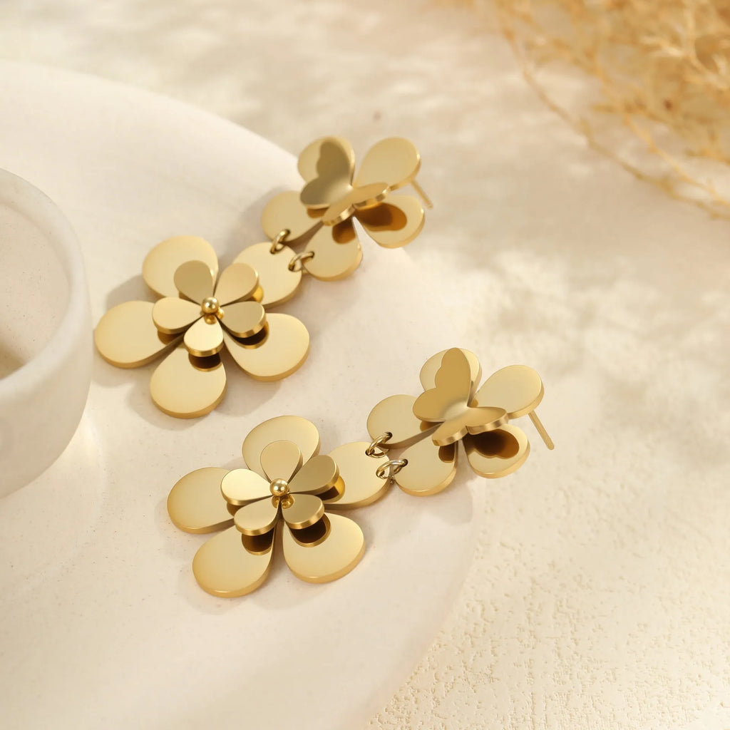 Gold electroplated stainless steel flower butterfly earrings for women with geometric zodiac design