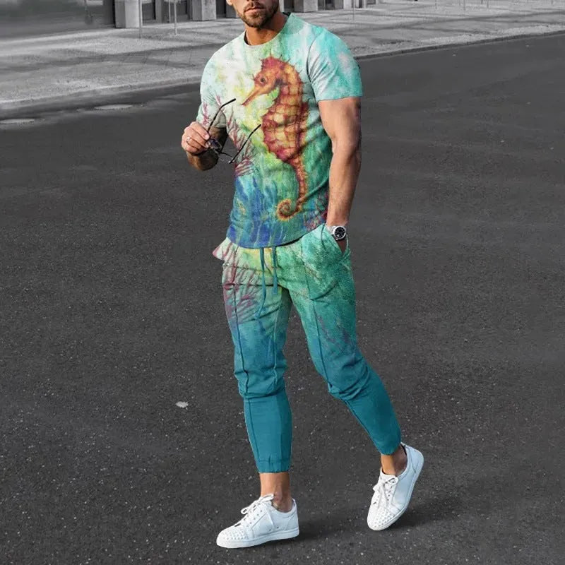 Man wearing a blue short-sleeved round neck pullover and matching trousers from a polyester sportswear set.