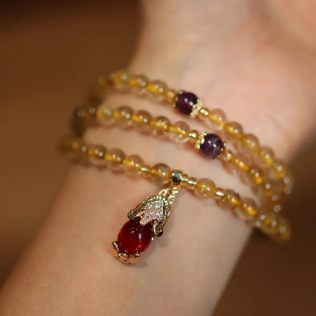Natural Brazil gold rutilated quartz bracelet with Chinese style design and hanging chopsticks