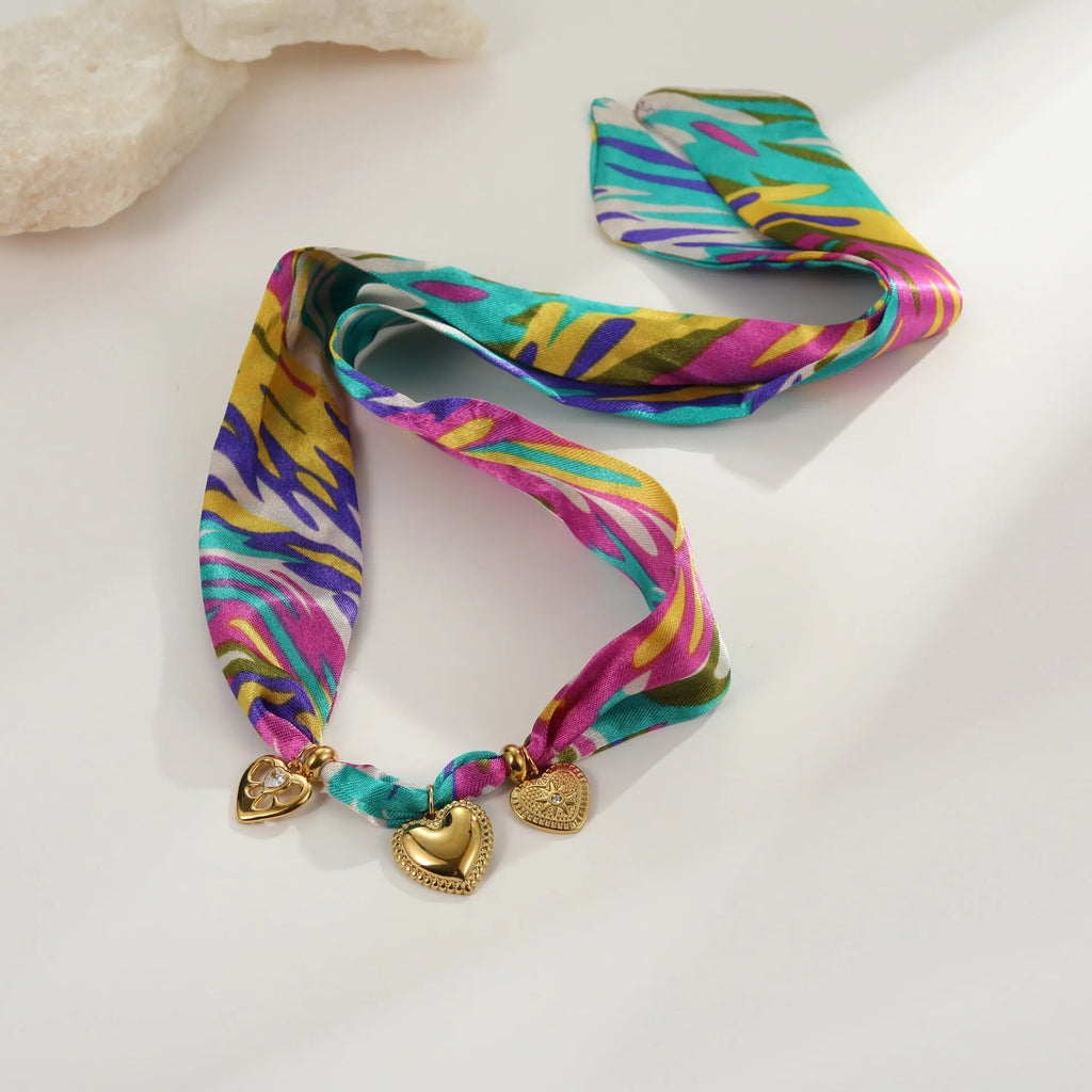 Women's stainless steel necklace or bracelet with 18K gold plating and geometric pendant design