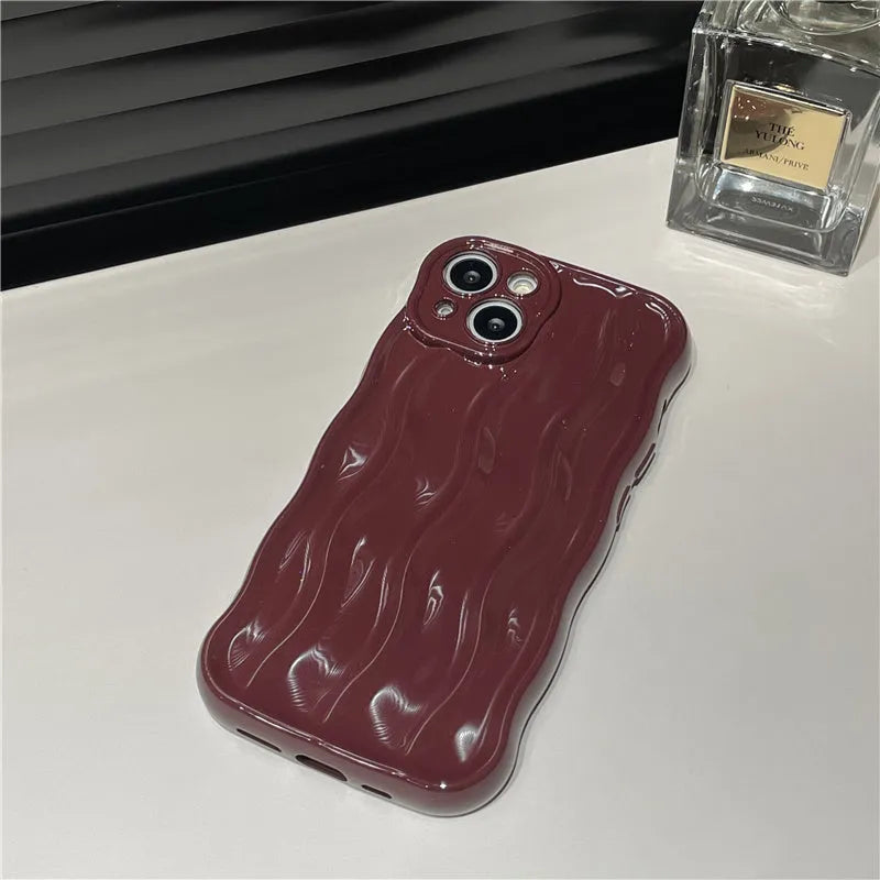 Silicone iPhone 17 case with water ripple texture in green colour showing soft-shell protective design
