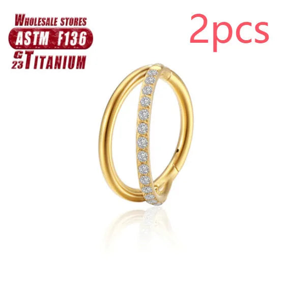 Titanium alloy fork nose ring in silver colour on a plain background, showing its shape and size.