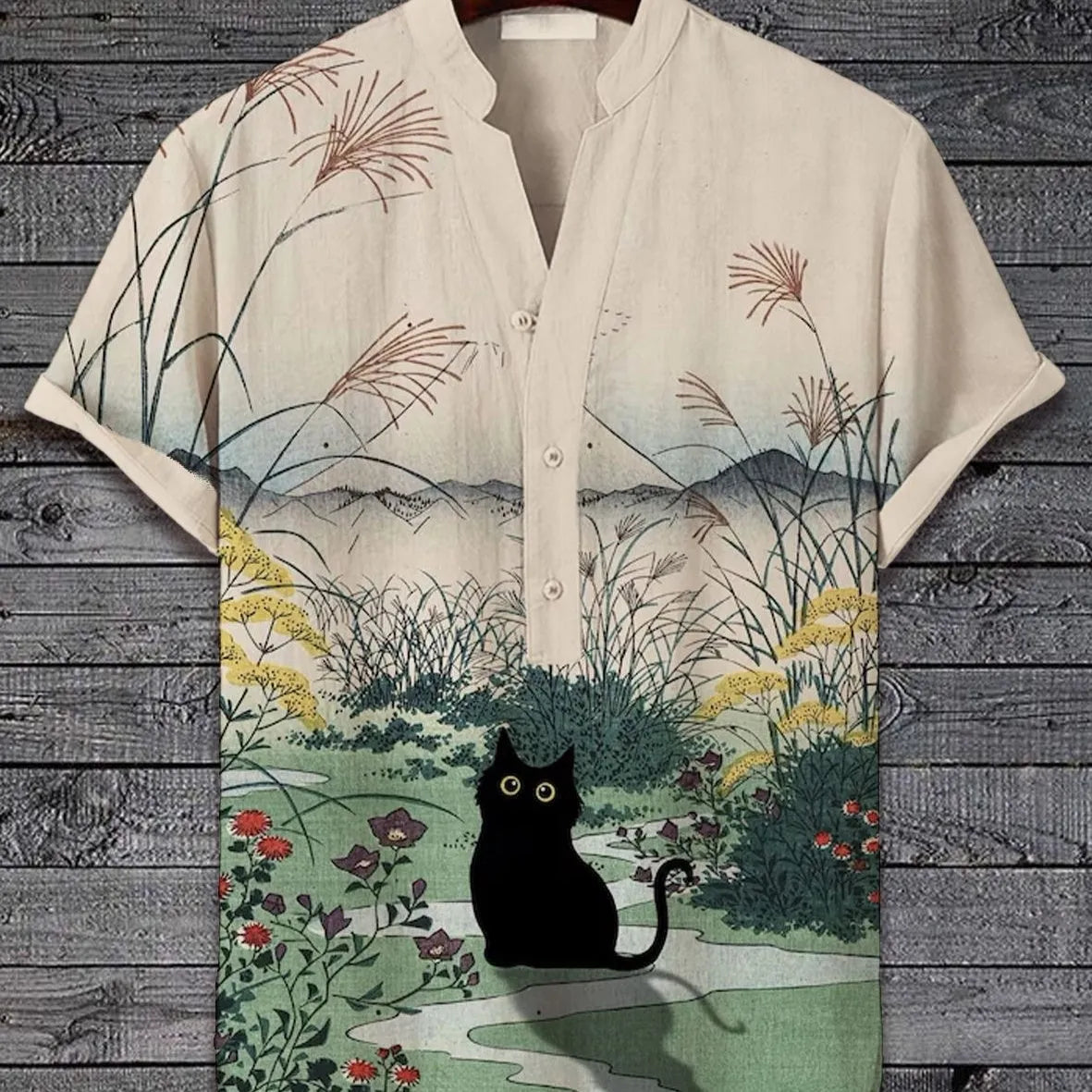 Man wearing a short sleeve shirt with a vivid 3D digital print of an animal graphic.