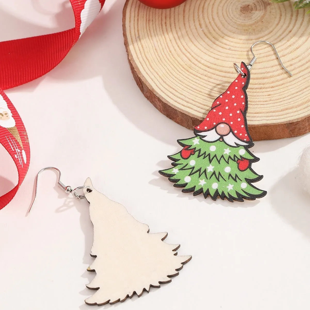 Wooden Christmas earrings with geometric shapes and printed Santa Claus designs