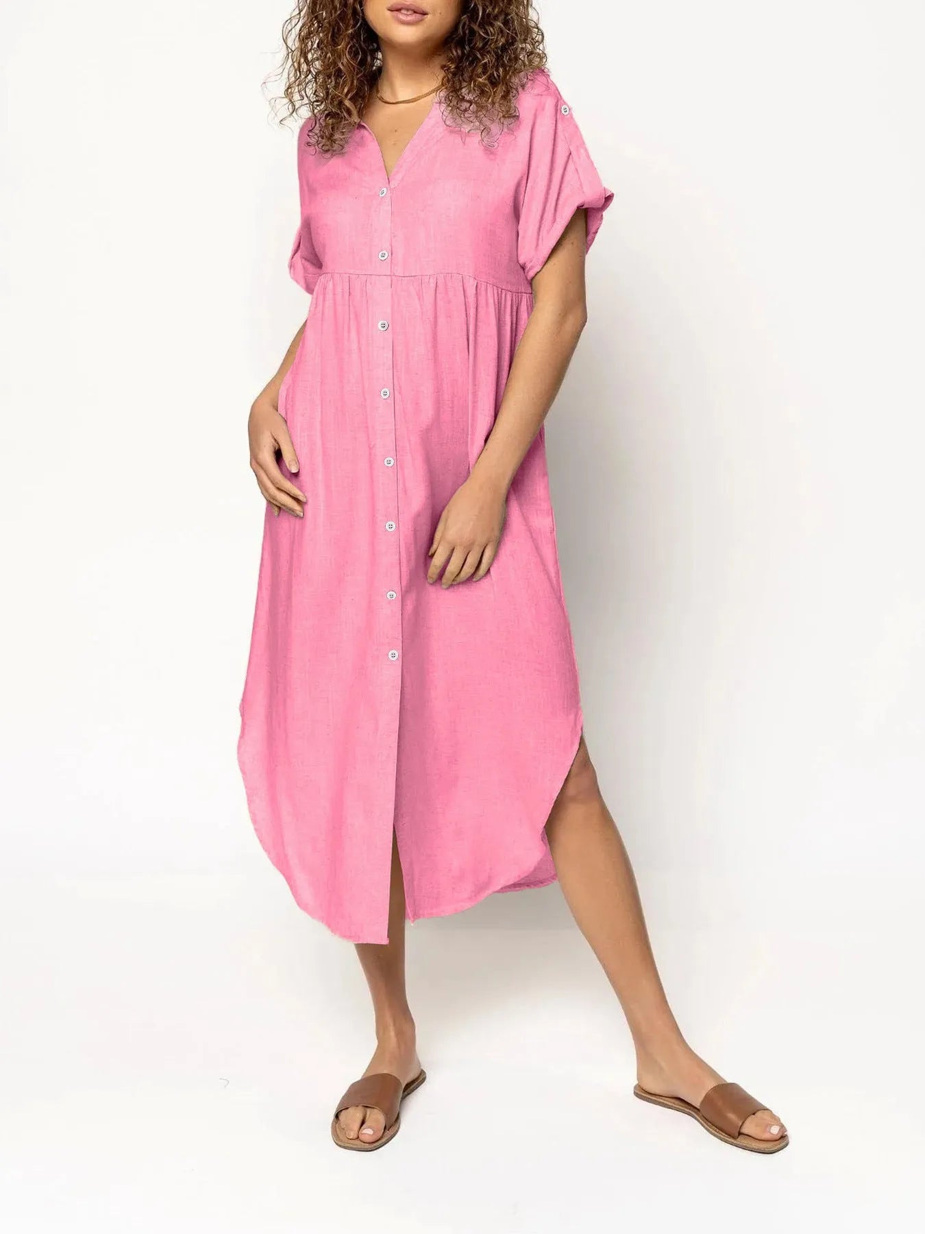 Women's loose-fit mid-length casual dress with button front in a solid colour.