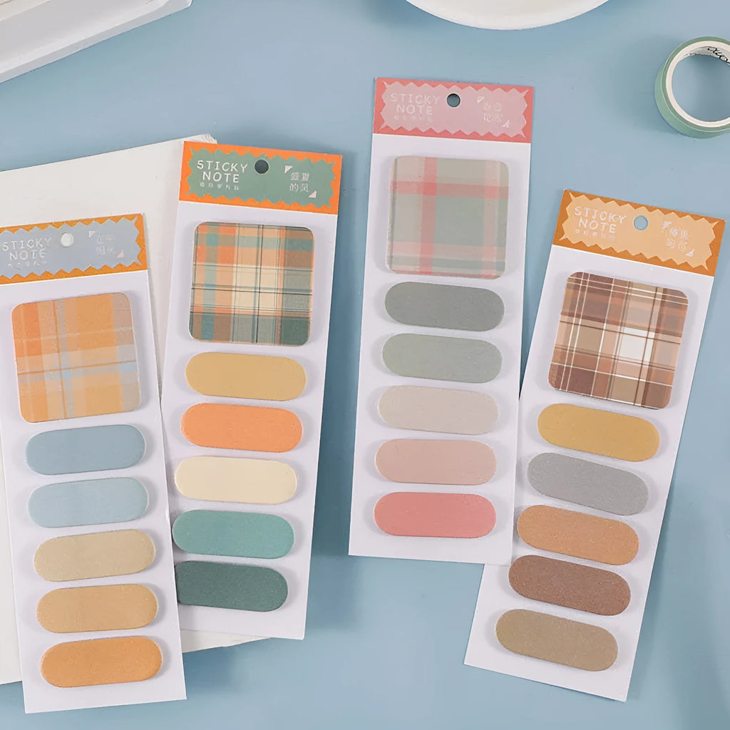 Colourful memo pad with 120 sticky notes in six plaid designs measuring 67mm by 200mm