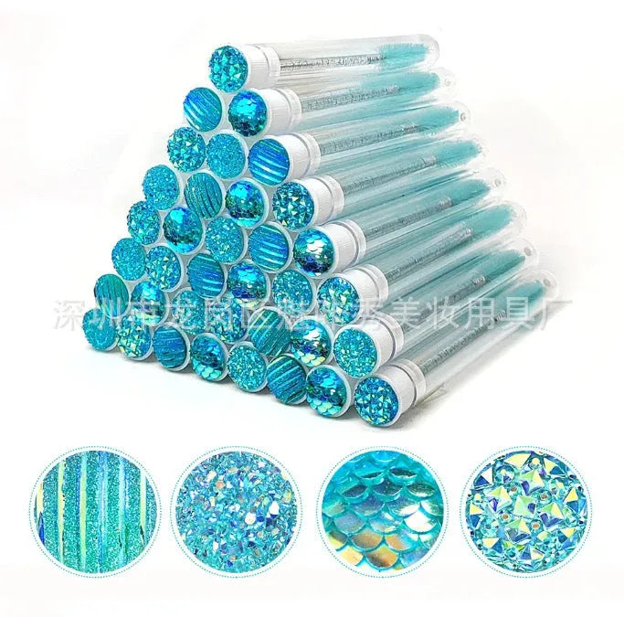 Set of coloured disposable mascara wands with clear plastic storage tubes
