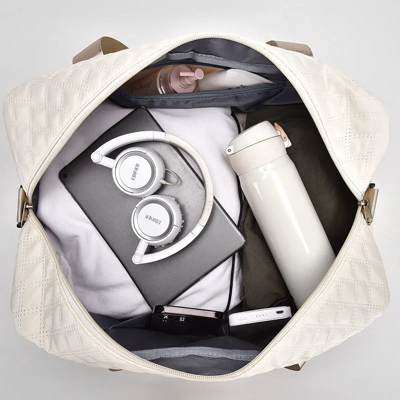 Large Oxford cloth travel bag with 36-55 litre capacity shown in haze blue colour