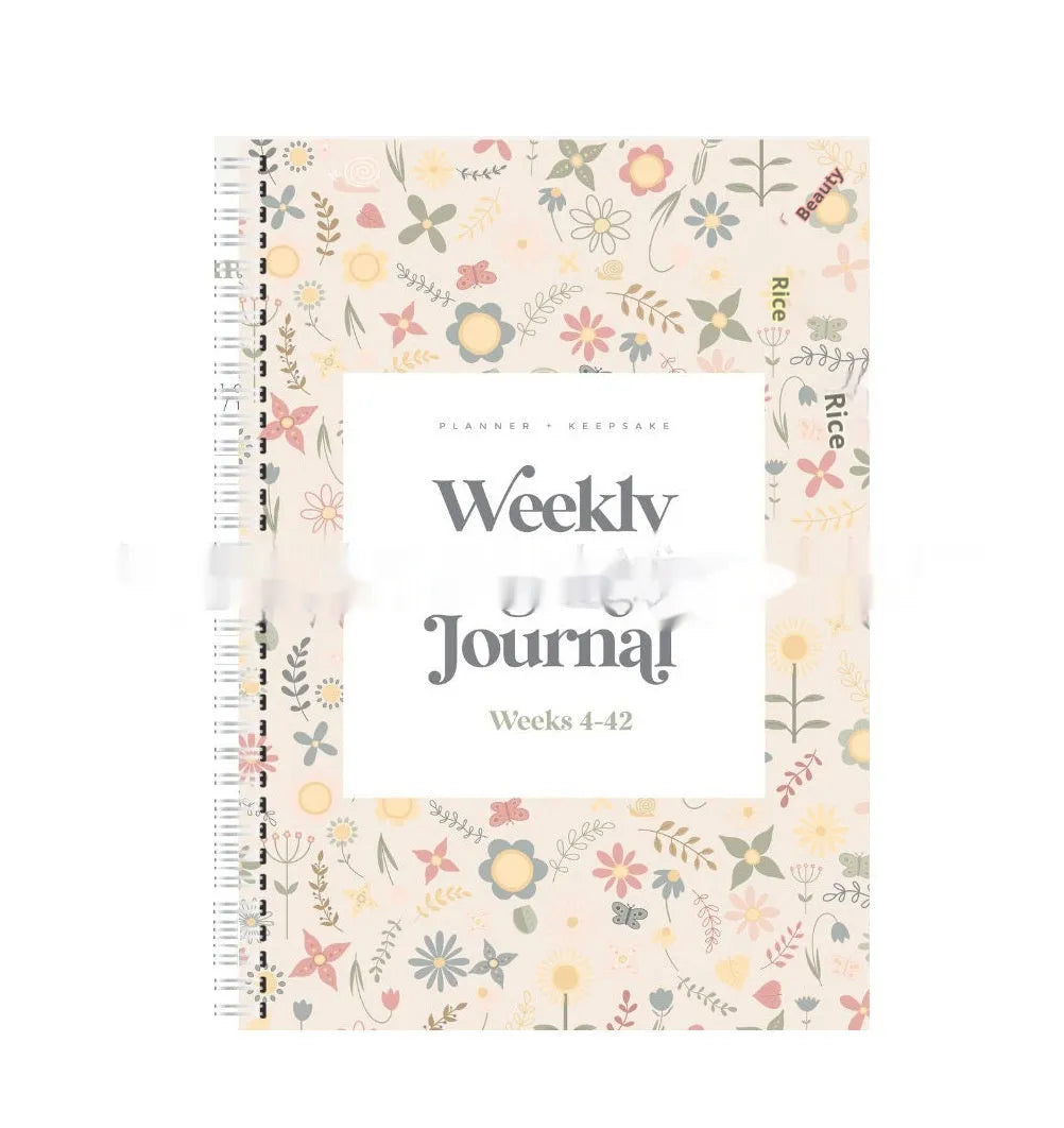 A5 pregnancy weekly diary notebook open showing weekly tracking pages