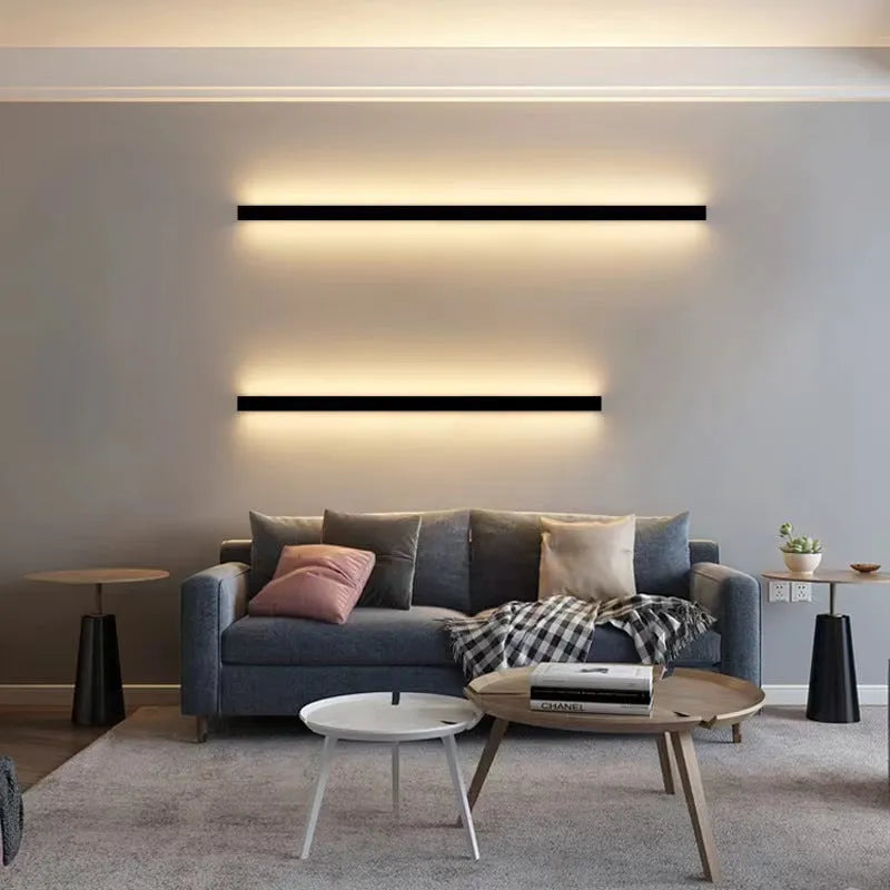 80cm long black aluminium LED strip wall lamp mounted on a wall, showcasing its simple linear design.