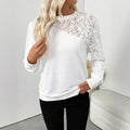 White long sleeve top with flower pattern, loose fit pullover style with regular sleeves