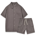 Women's plain two-piece casual set with short sleeve top and elastic waist shorts in beige.