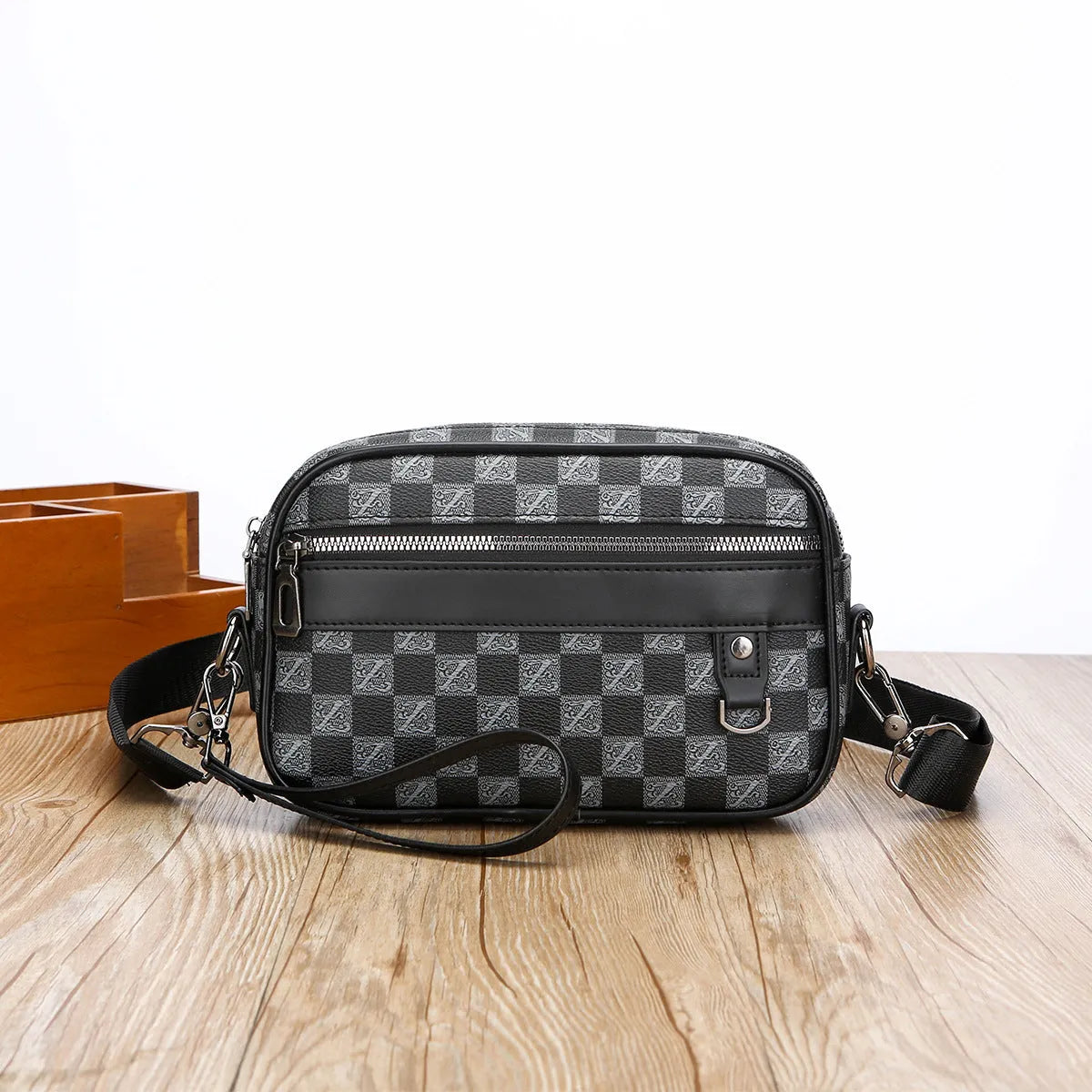 Men's geometric pattern PU messenger bag shown in a horizontal carry position.