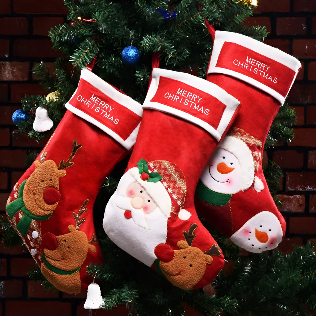 Christmas sock pendant decorations showing elk, Santa, and snowman motifs