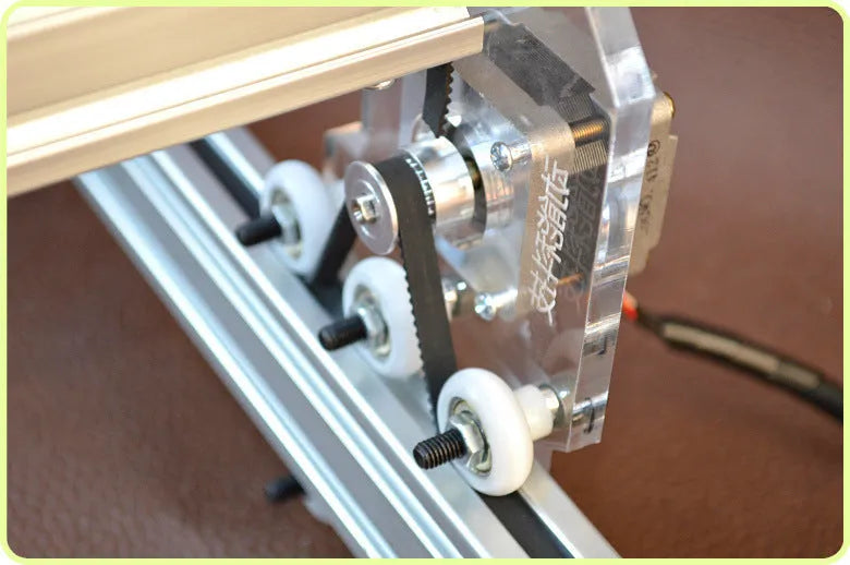 Miniature laser engraving machine with 3000mW output and 400x300mm base dimensions