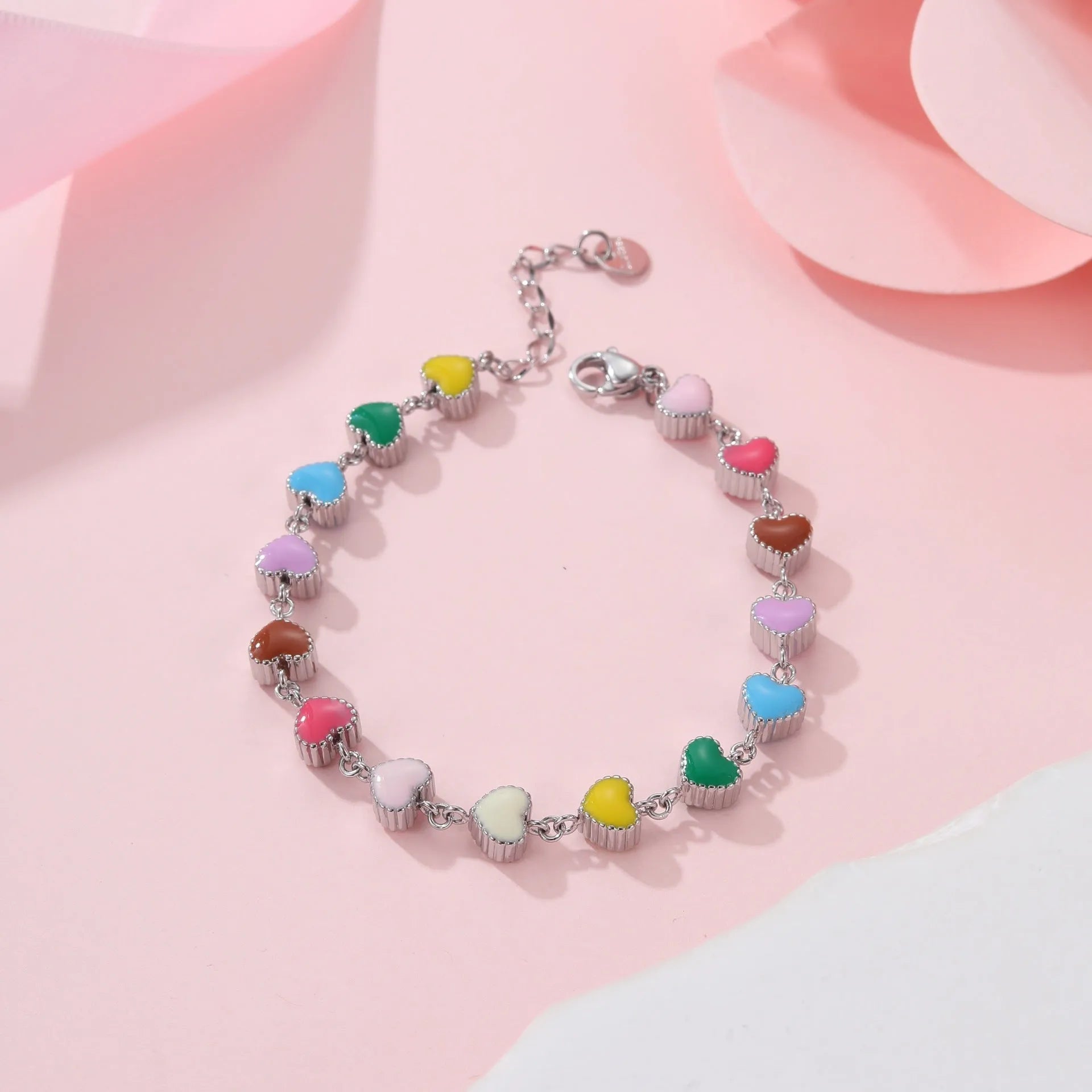 Heart-shaped titanium steel bracelet with colourful oil elements in gold or steel colour options