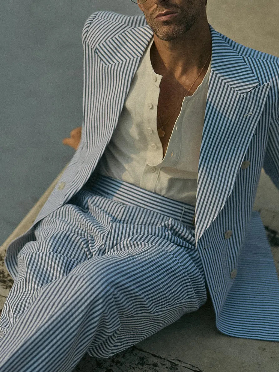 Women's blue and white striped polyester suit set with blazer, trousers and shirt
