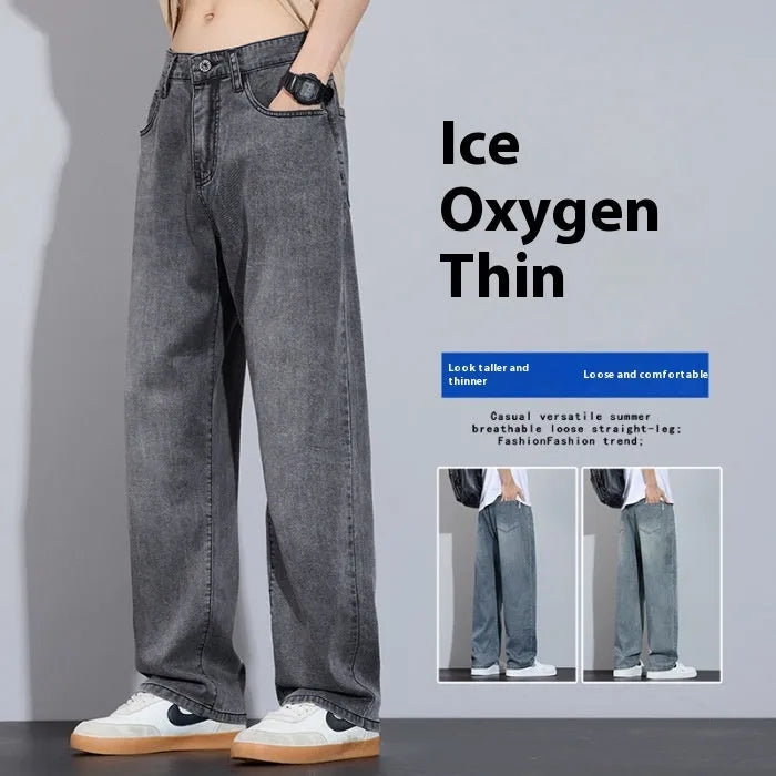 Light blue ice silk straight-leg wide trousers laid flat, showing zip fly and relaxed leg cut.