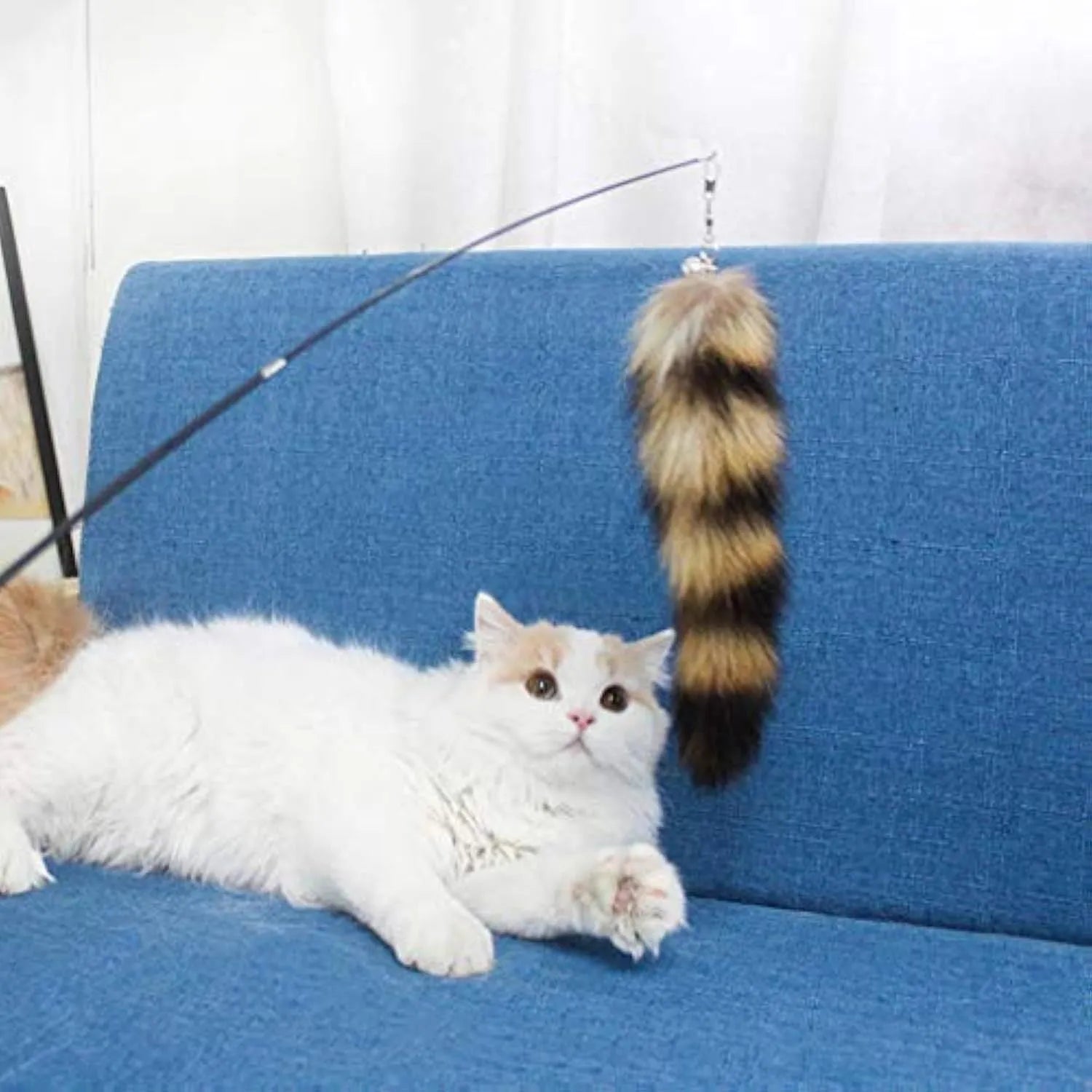 Black cat toy wand teaser with a long handle and elastic string for interactive play.