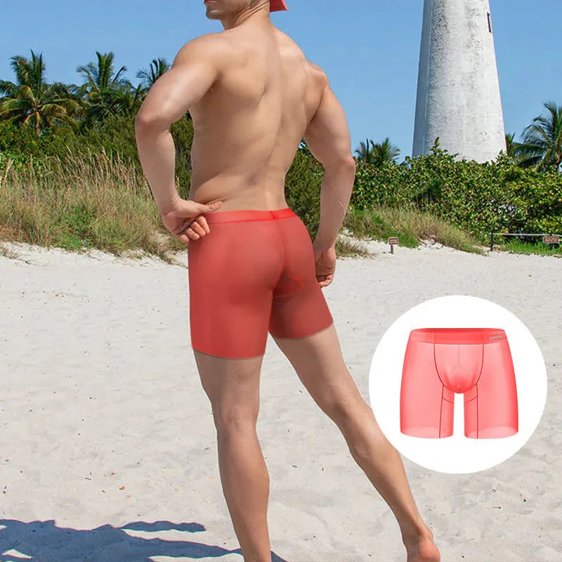 Men's solid colour ice silk boxer shorts on a white background, showing low waist design.