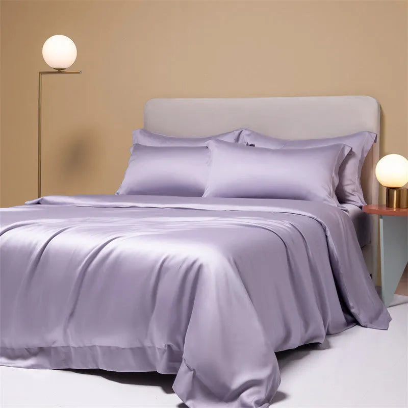 Lenzing Tencel 200 thread count bedding set in satin weave showing Aurora Blue quilt cover and pillowcases
