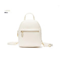 Soft black PU mini backpack with front pockets, shown open to reveal internal mobile phone sleeve and zipper compartment.