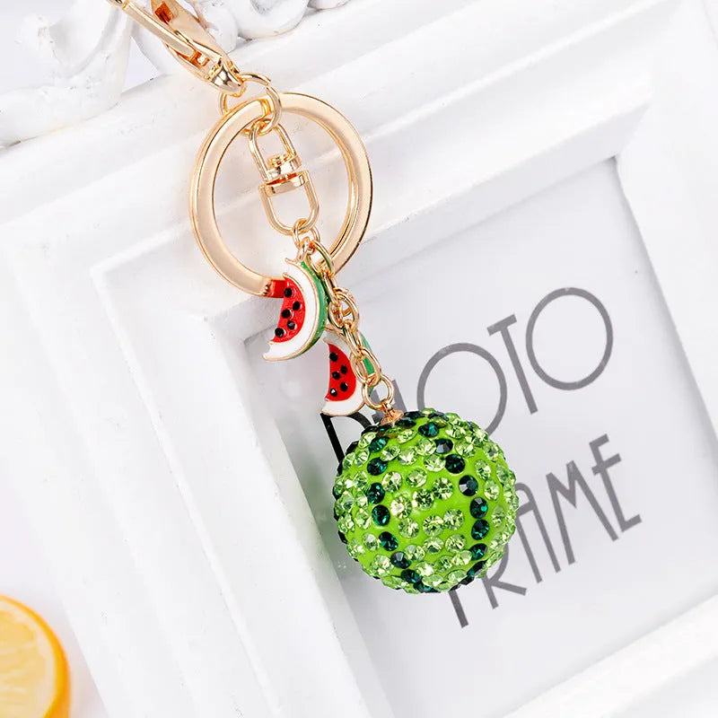 Green watermelon-shaped metal keychain measuring 12cm, made from zinc alloy