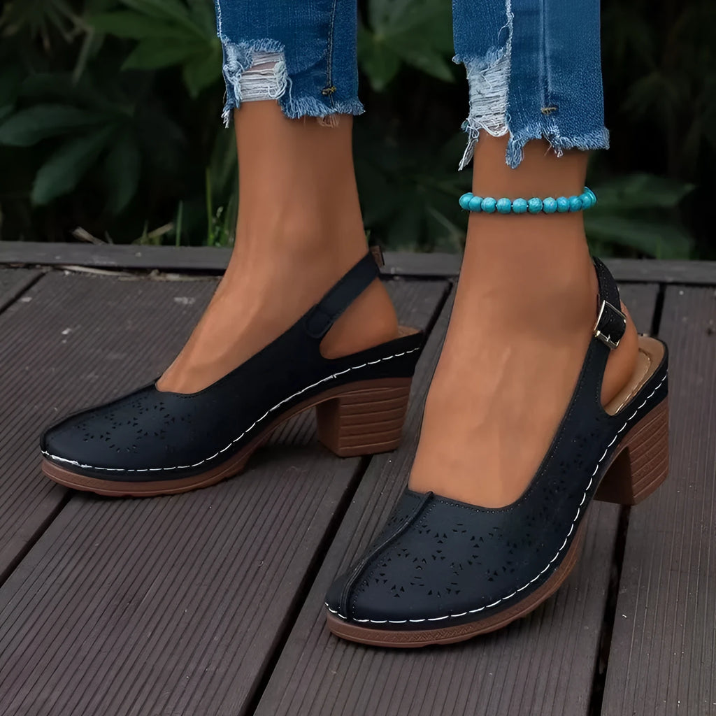Women's black closed toe wedge sandal with a round toe and rubber sole, size 39.