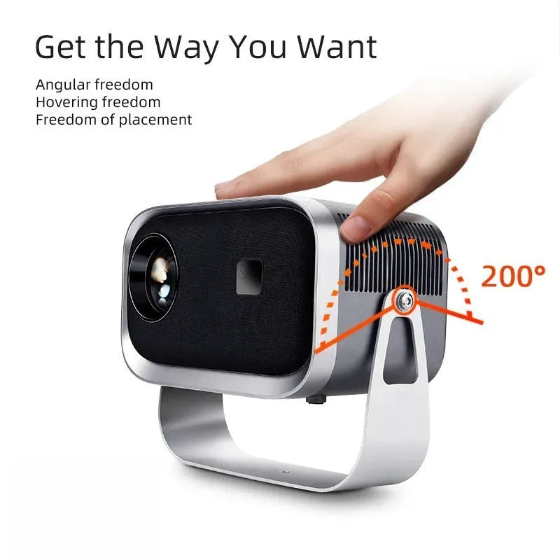 White portable Android smart home theatre projector on a wooden table, projecting a high-definition movie scene.