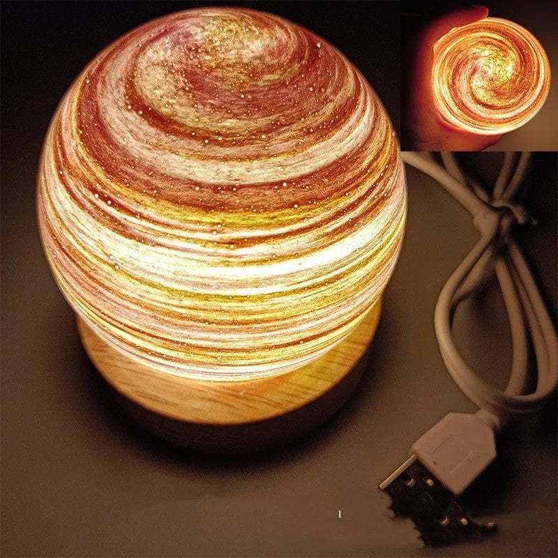 Planet-themed USB plug-in night light with three-colour dimming on a base, showing 80x90mm size.