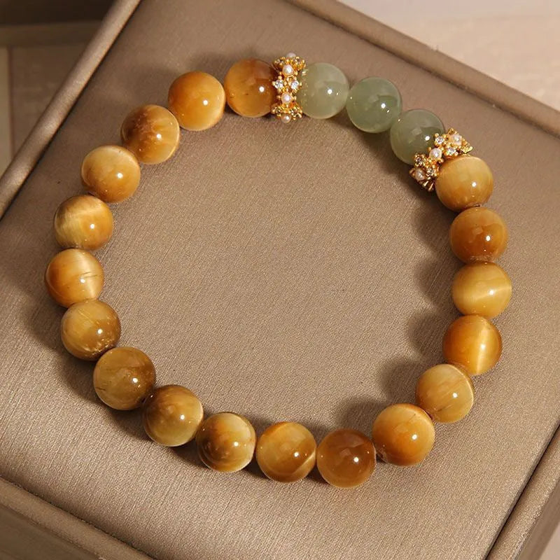 Natural yellow Tiger's Eye Hetian Jade bracelet in U-shape with gold gourd charm.