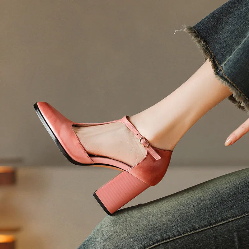 Retro pointed-toe women's Mary Jane shoes with a hollow design and buckle strap in pink or dark brown.