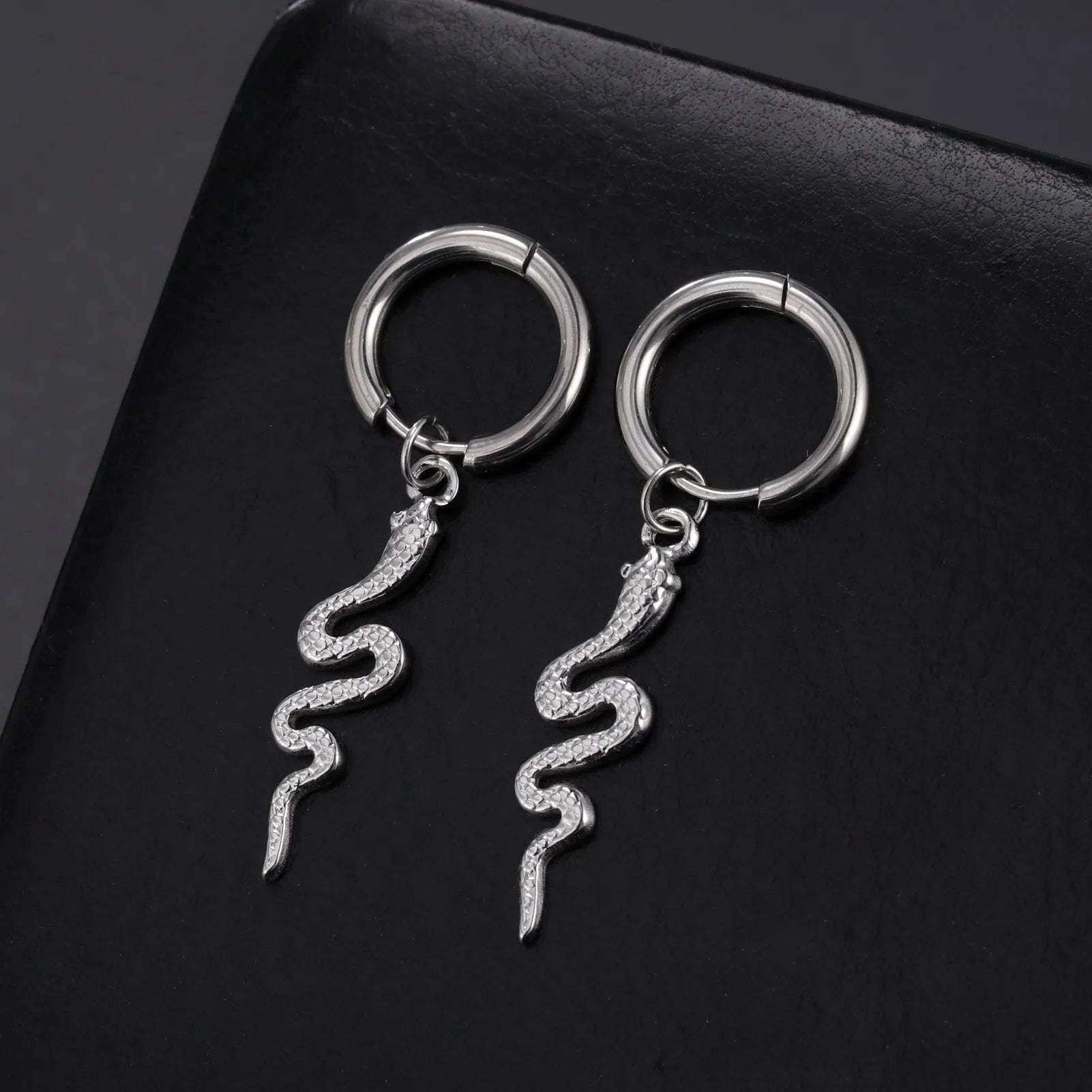 Stainless steel snake vintage earrings with gold plating and ear clip design