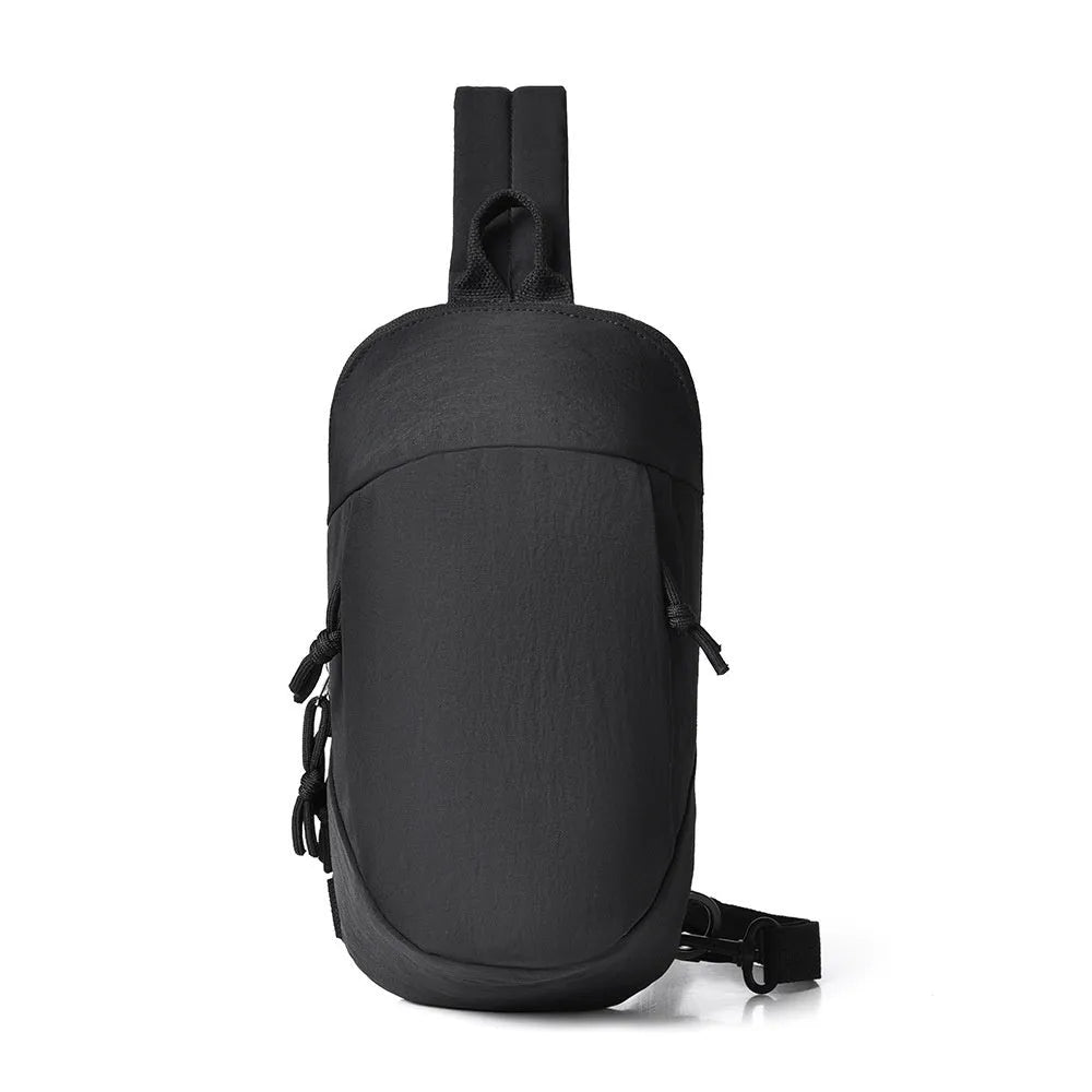Outdoor crossbody bag in nylon fabric with mobile phone compartment, shown in army green colour