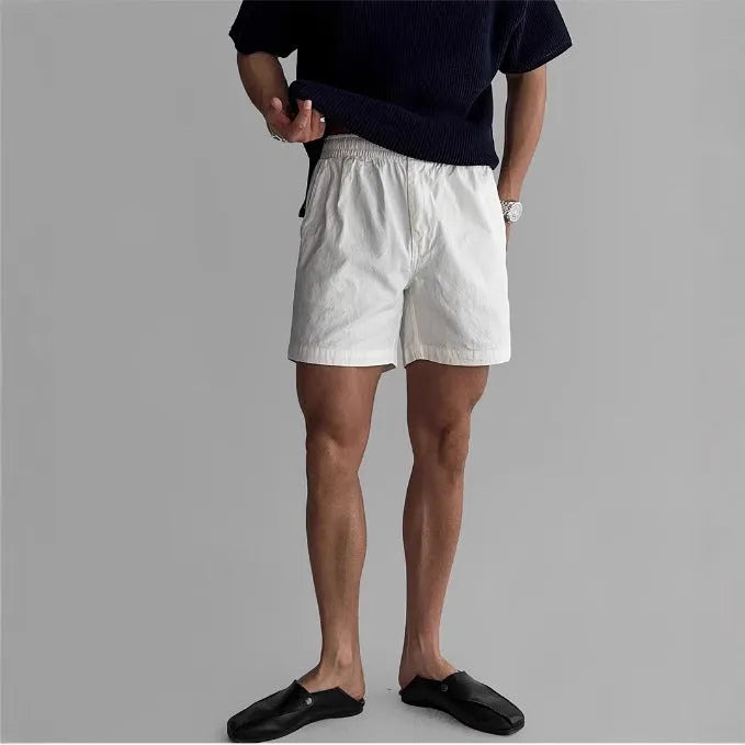Cotton loose-fit sports shorts in black, white or khaki colour options