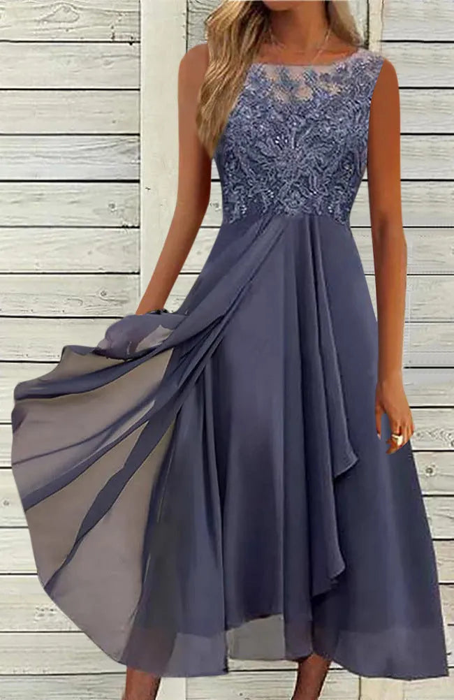 Women's sleeveless chiffon dress with lace hollow-out stitching, midi length, shown in blue.