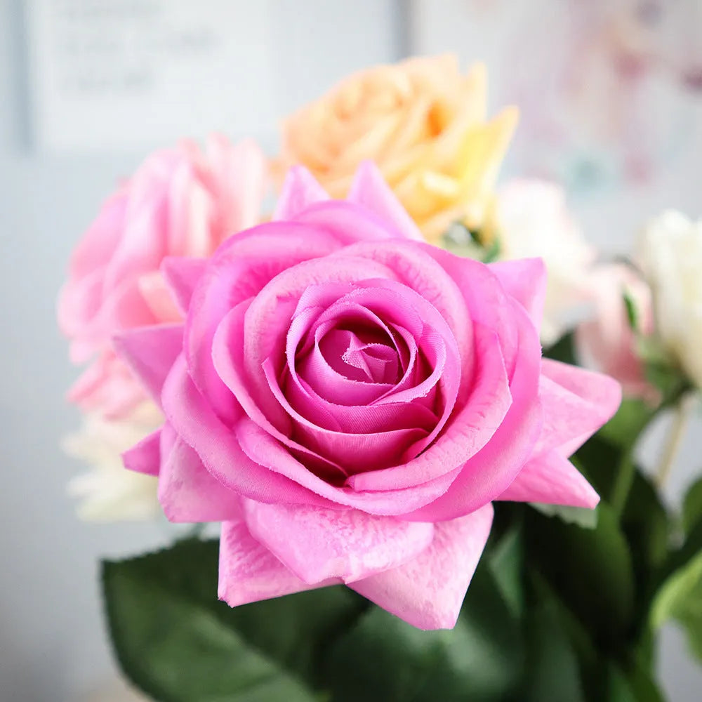 Silk artificial rose bouquet with 8.5cm flower heads in red, orange, white or purple fringe pink colours