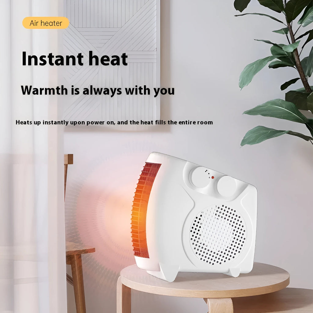 Small white ceramic desktop electric heater with control dial, shown on a wooden desk.