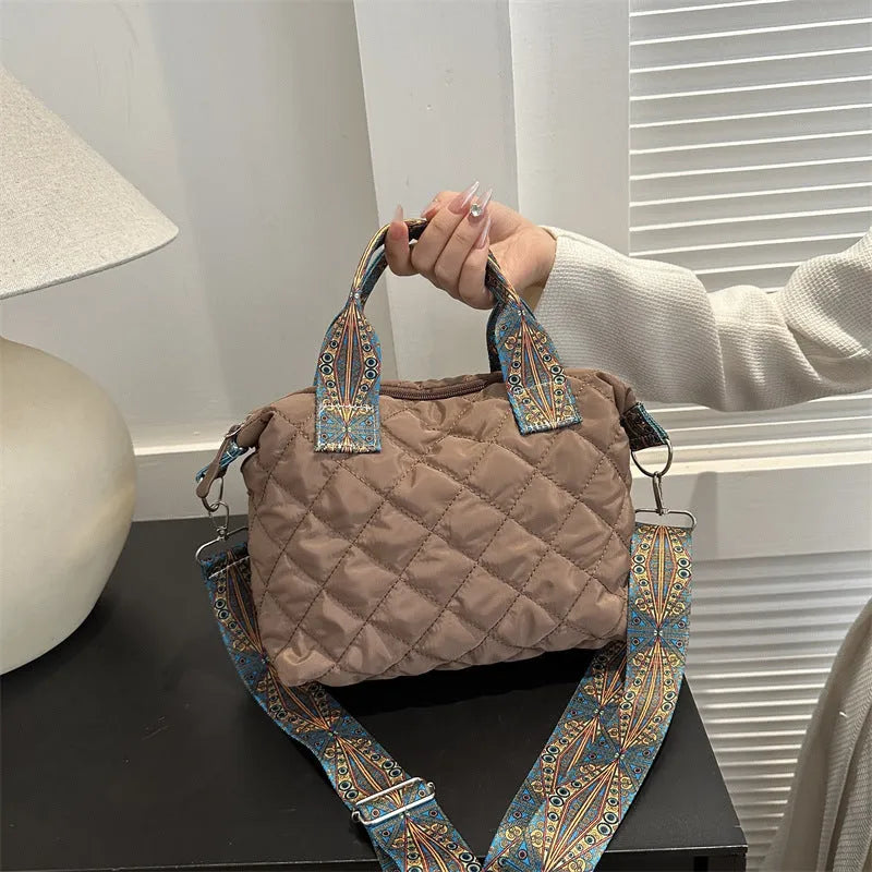 Soft Oxford cloth messenger bag with embroidery details and internal phone pocket in horizontal square shape