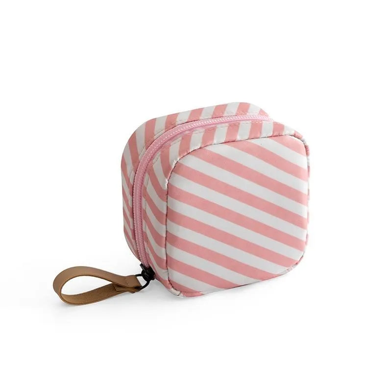 Cube-shaped cloth makeup storage bag with zip closure in blue, pink, white colour options