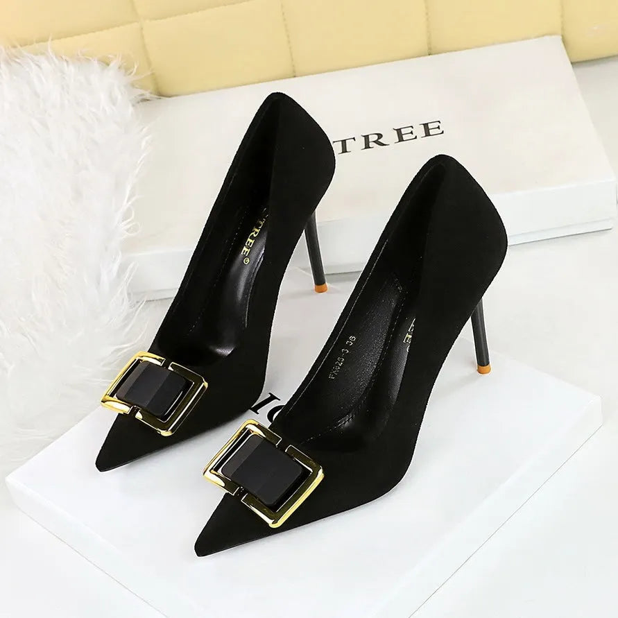 Black suede women's stiletto high heels with a pointed toe and a 9cm heel