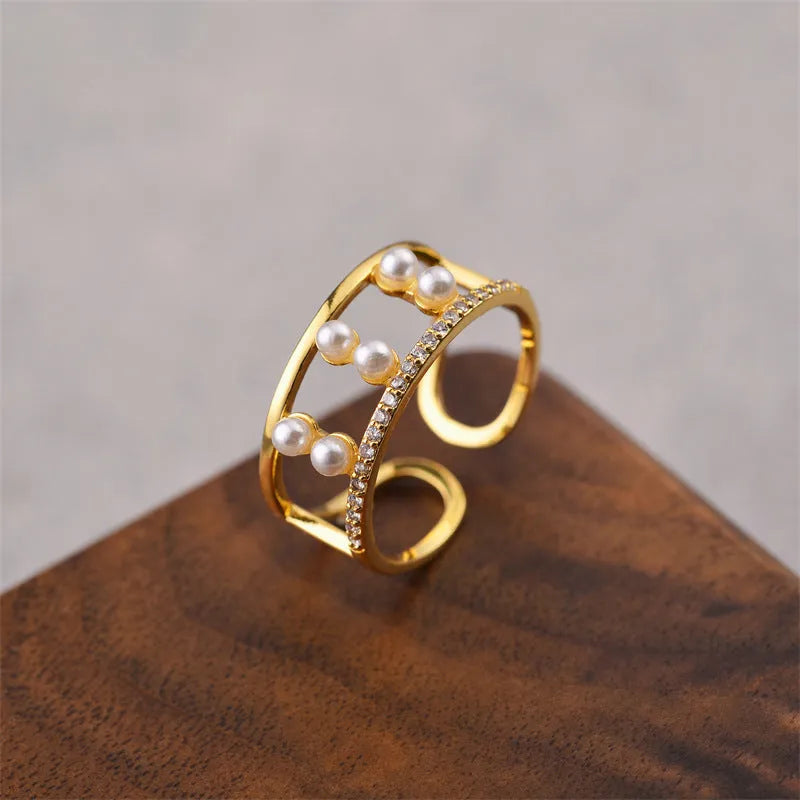 Gold geometric open adjustable women's ring showing Korean fashion design with electroplated finish