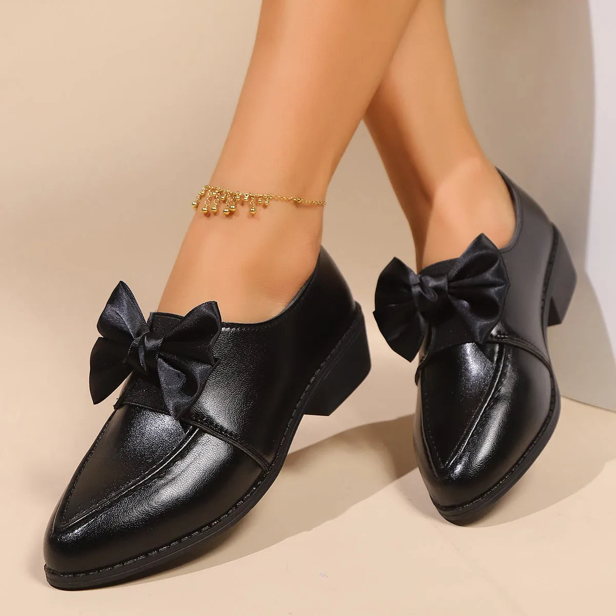 Women's British-style flat shoes with bow detail on PU upper and rubber sole