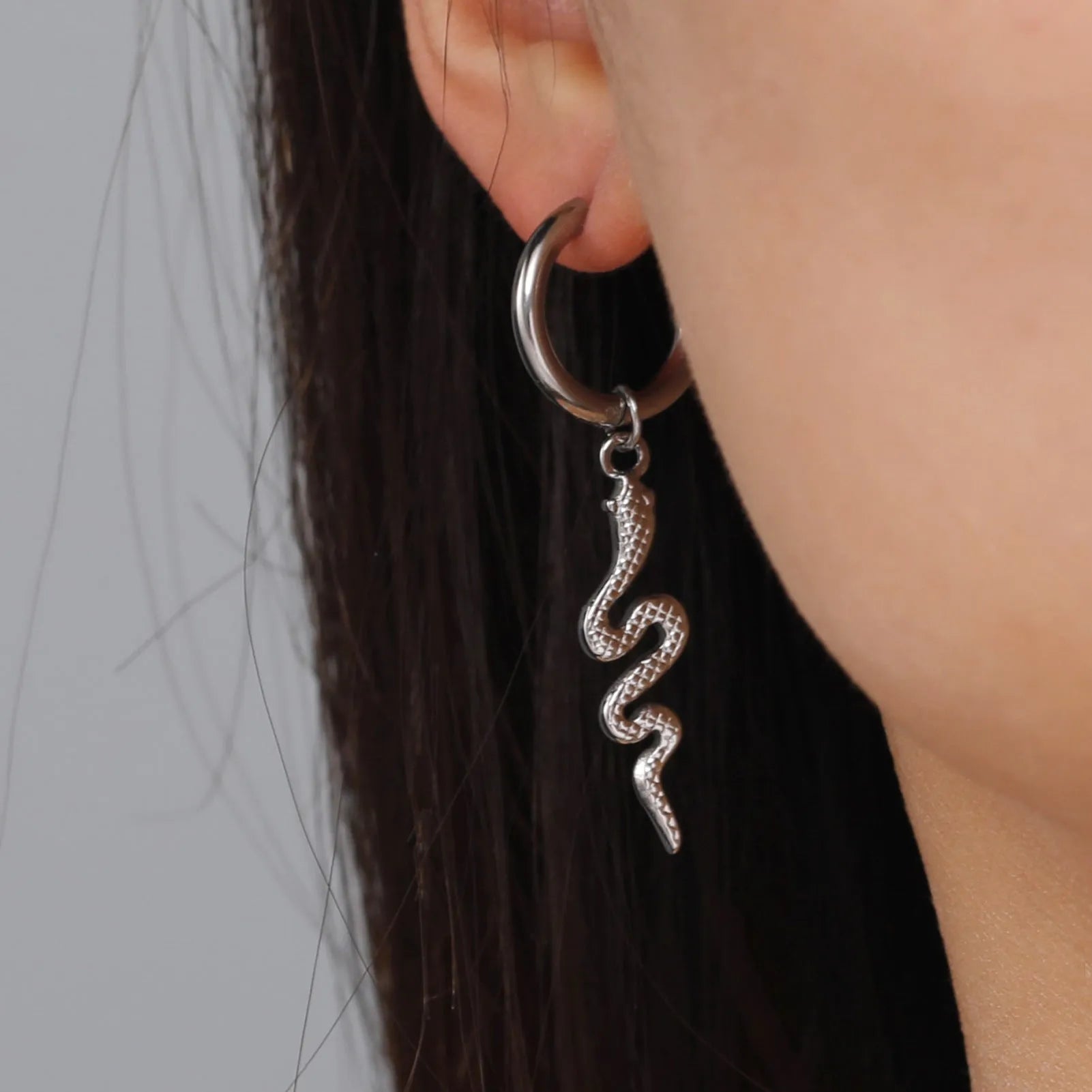 Stainless steel snake vintage earrings with gold plating and ear clip design